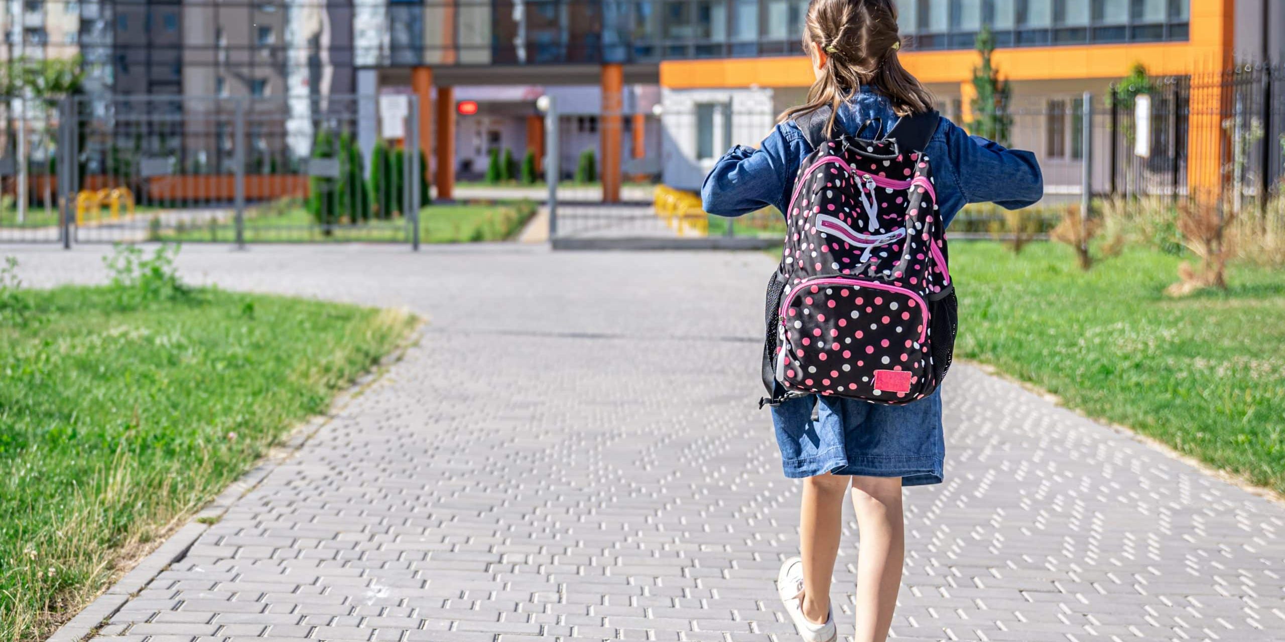 little-girl-goes-elementary-school-child-with-backpack-is-going-study-back-school-concept